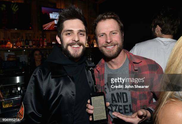 Thomas Rhett and Dierks Bentley attend the Nashville Opening of Dierks Bentley's Whiskey Row on January 14, 2018 in Nashville, Tennesse