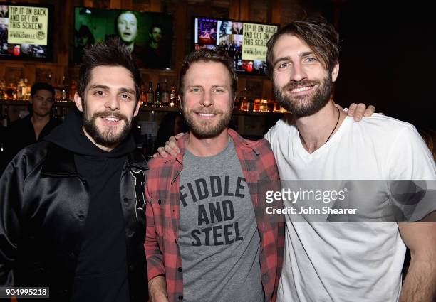 Thomas Rhett, Dierks Bentley, and Ryan Hurd attend the Nashville Opening of Dierks Bentley's Whiskey Row on January 14, 2018 in Nashville, Tennesse