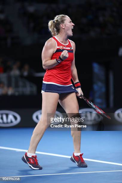 Timea Babos of Hungary celebrates winning a point in her first round match against CoCo Vandeweghe of the United States on day one of the 2018...