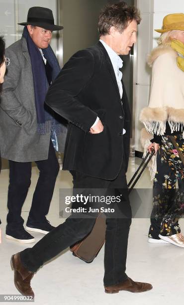 Actor Hugh Grant and Hugh Bonneville are seen upon arrival at Narita International Airport on January 15, 2018 in Narita, Japan.