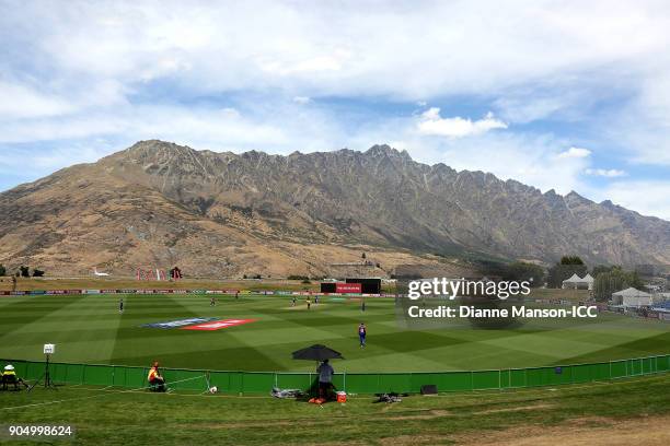 General view of play with the Remarkables in the background during the ICC U19 Cricket World Cup match between England and Namibia at John Davies...