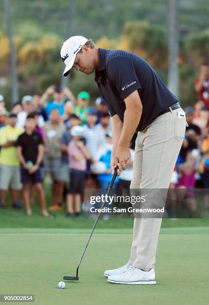 Patton Kizzire of the United States makes a par putt on the sixth playoff hole to defeat James Hahn and win the Sony Open In Hawaii at Waialae...