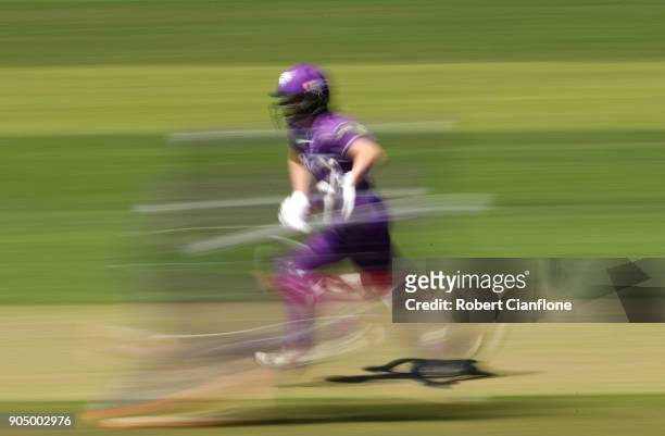 Georgia Redmayne of the Hurricanes makes a run during the Women's Big Bash League match between the Hobart Hurricanes and the Melbourne Renegades at...