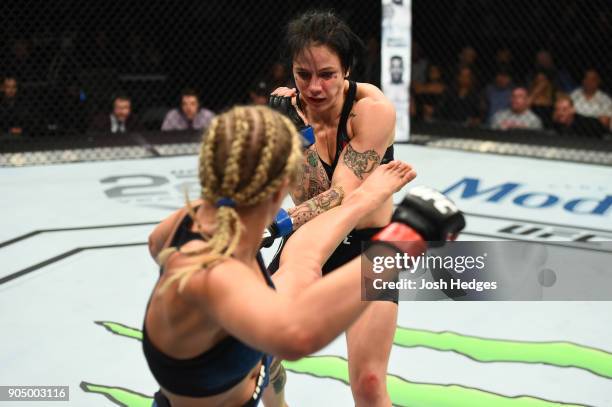 Paige VanZant kicks Jessica-Rose Clark of Australia in their women's flyweight bout during the UFC Fight Night event inside the Scottrade Center on...