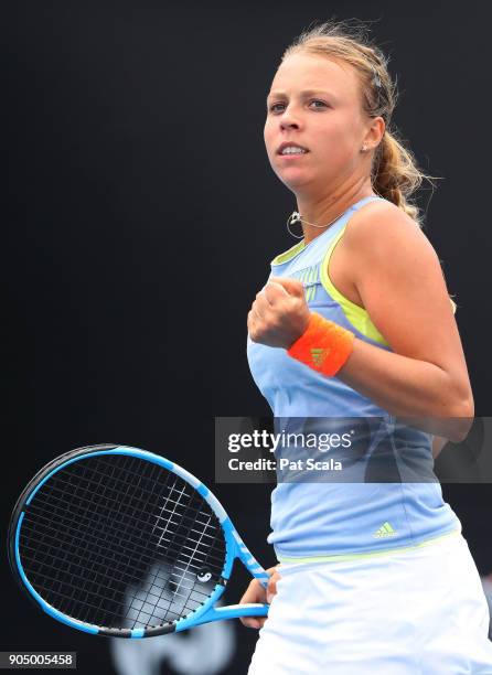 Anett Kontaveit of Estonia celebrates winning a point in her first round match against Aleksandra Krunic of Serbia on day one of the 2018 Australian...