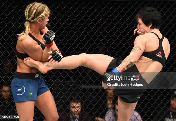Jessica-Rose Clark of Australia kicks Paige VanZant in their women's flyweight bout during the UFC Fight Night event inside the Scottrade Center on...