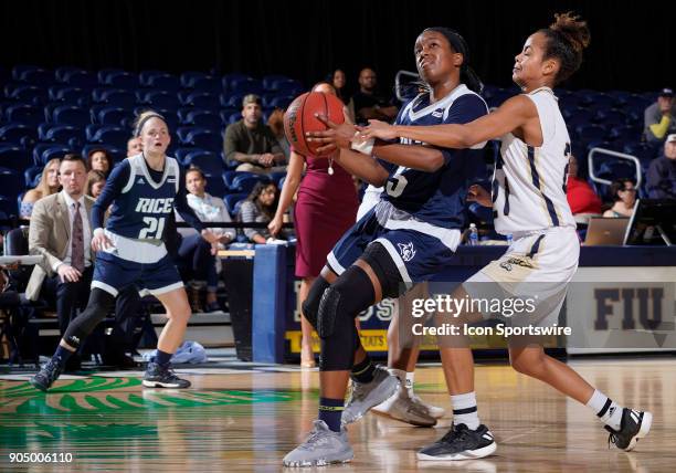 Guard Alexis Gordon guards Rice guard Lauren Grigsby during a college basketball game between the Rice University Owls and the Florida International...