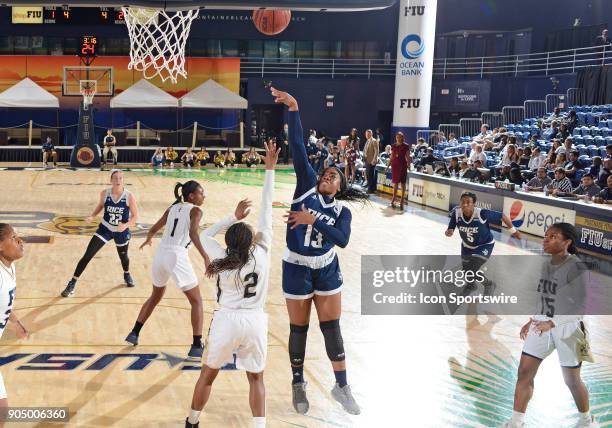 Rice guard Erica Ogwumike shoots during a college basketball game between the Rice University Owls and the Florida International University Panthers...