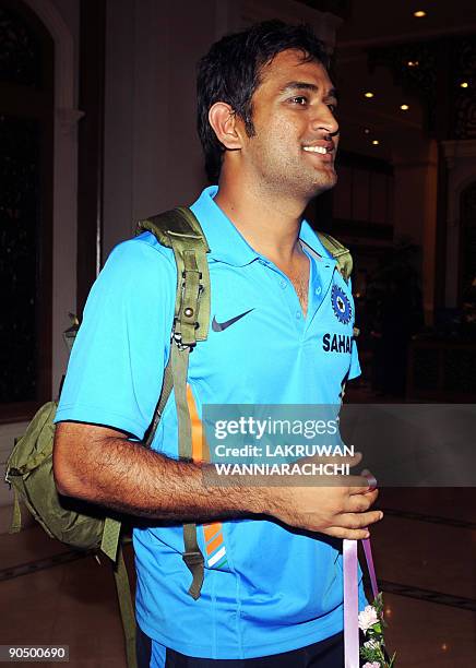 Indian cricket captain Mahendra Singh Dhoni arrives in Colombo on September 9, 2009. India, New Zealand and Sri Lanka began a one-day international...