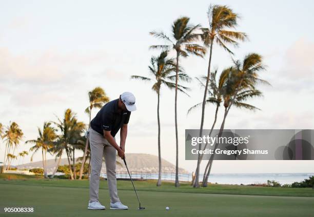 Patton Kizzire of the United States makes a par putt on the sixth playoff hole to defeat James Hahn and win the Sony Open In Hawaii at Waialae...