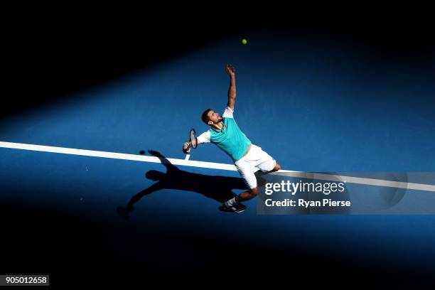 Marin Cilic of Croatia serves in his first round match against Vasek Pospisil of Canada on day one of the 2018 Australian Open at Melbourne Park on...