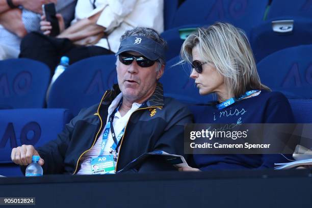 Will Ferrell and his wife Viveca Paulin watch the first round match between Grigor Dimitrov of Bulgaria and Dennis Novak of Austria on day one of the...