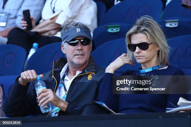 Will Ferrell and his wife Viveca Paulin watch the first round match between Grigor Dimitrov of Bulgaria and Dennis Novak of Austria on day one of the...