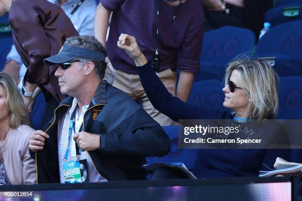 Will Ferrell and his wife Viveca Paulin watch the first round match between Grigor Dimitrov of Bulgaria and Dennis Novak of Austria on day one of the...