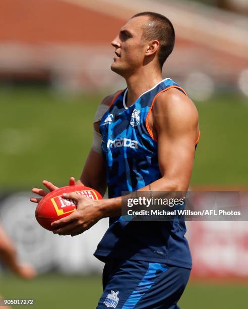 Braydon Preuss of the Kangaroos in action during a North Melbourne Kangaroos Training Session at Arden Street Ground on January 15, 2018 in...