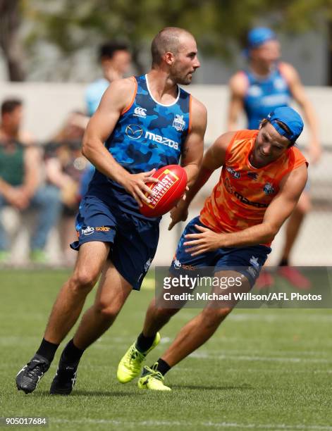 Ben Cunnington and Luke McDonald of the Kangaroos in action during a North Melbourne Kangaroos Training Session at Arden Street Ground on January 15,...