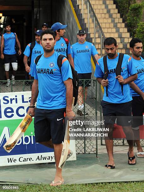 Indian cricketer Yuvraj Singh and teammates arrive for a practice session at The R Premadasa Stadium in Colombo on September 9, 2009. India, New...