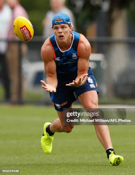 Mason Wood of the Kangaroos in action during a North Melbourne Kangaroos Training Session at Arden Street Ground on January 15, 2018 in Melbourne,...