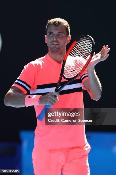 Grigor Dimitrov of Bulgaria celebrates after winning his first round match against Dennis Novak of Austria on day one of the 2018 Australian Open at...
