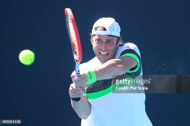 Paolo Lorenzi of Italy plays a backhand in his first round match against Damir Dzhumhur of Bosnia and Herzegovina on day one of the 2018 Australian...