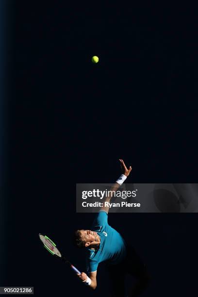 Vasek Pospisil of Canada serves in his first round match against Marin Cilic of Croatia on day one of the 2018 Australian Open at Melbourne Park on...