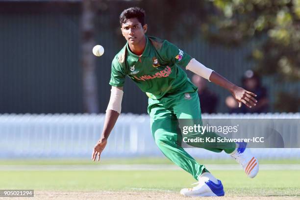 Hasan Mahmud of Bangladesh fields the ball off his own bowling during the ICC U19 Cricket World Cup match between Bangladesh and Canada at Bert...