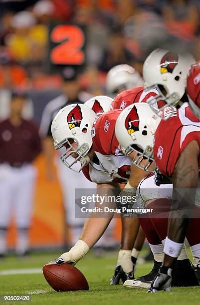 The Arizona Cardinals offense prepares to snap the ball as the Cards offense squares off against the Denver Broncos on the line of scrimmage during...