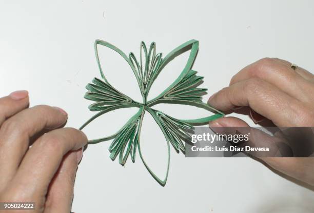 making stars with empty toilet paper roll - toilet paper tree bildbanksfoton och bilder