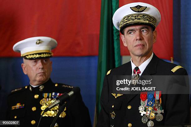French General Stephane Abrial of the French Air Force stands next to US General James N. Mattis, USMC, during the ceremony transfering his command...