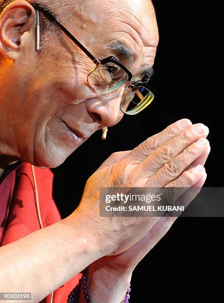 Exiled Tibetan spiritual leader the Dalai Lama gestures as he attends a lecture organized by the Jan Langos Foundation in Bratislava on September...