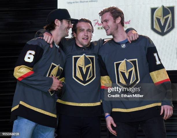 Colin Miller, Brendan Leipsic and Jon Merrill of the Vegas Golden Knights joke around after being introduced at the Vegas Golden Knights Fan Fest at...