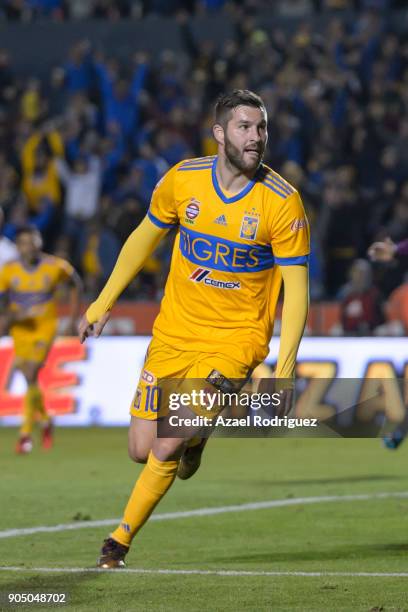 Andre-Pierre Gignac of Tigres celebrates after scoring his team's second goal during the 2nd round match between Tigres UANL and Santos Laguna as...