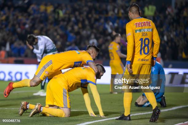Andre-Pierre Gignac of Tigres celebrates with teammate Eduardo Vargas after scoring his team's second goal during the 2nd round match between Tigres...