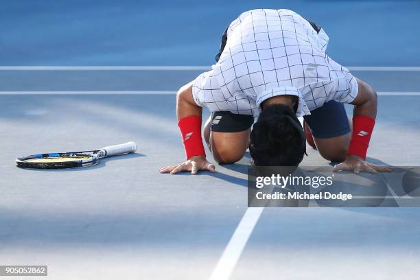 Yuichi Sugita of Japan celebrates winning his first round match against Jack Sock of the United States on day one of the 2018 Australian Open at...