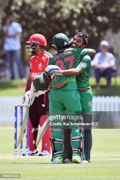 Mohammad Tawhid Hridoy of Bangladesh is congratulated by Aminul Islam Biplob of Bangladesh after scoring a century during the ICC U19 Cricket World...