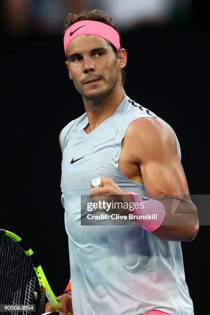 Rafael Nadal of Spain celebrates winning a point in his first round match against Victor Estrella Burgos of the Dominican Republic on day one of the...