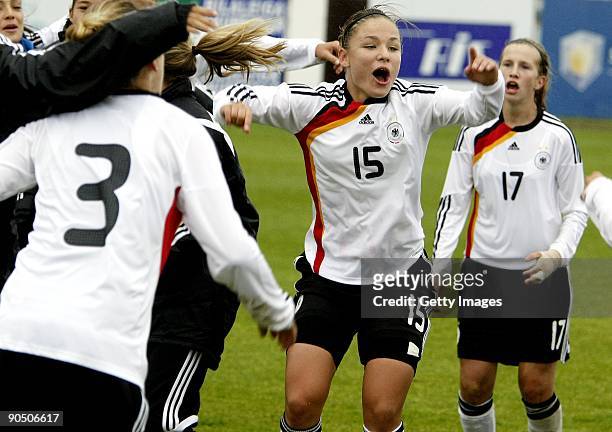 German U17 team players Luisa Wensing, Silvana Chojnowski and Annabel Jaeger celebrate after winning France in Women's Euro qualifying match between...