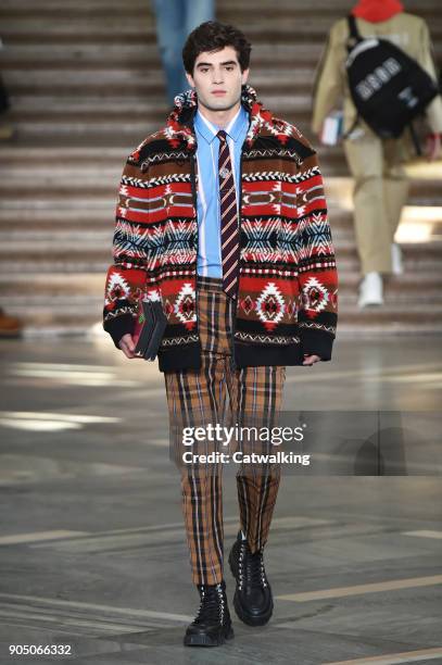 Model walks the runway at the MSGM Autumn Winter 2018 fashion show during Milan Menswear Fashion Week on January 14, 2018 in Milan, Italy.