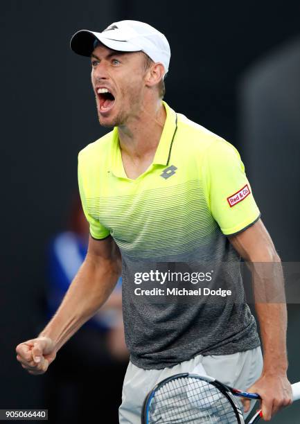 John Millman of Australia celebrates winning his first round match against Borna Coric of Croatia on day one of the 2018 Australian Open at Melbourne...