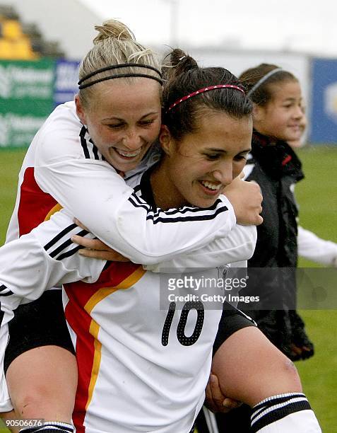 German U17 team player Kyra Malinowski and and team mate celebrate after winning France in Women's Euro qualifying match between U17 France and U17...