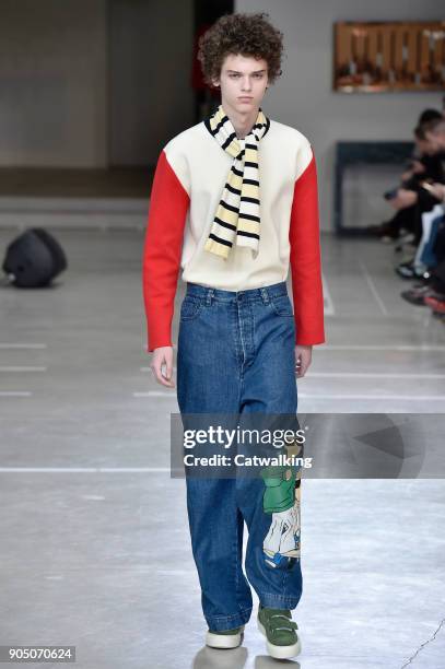 Model walks the runway at the Sunnei Autumn Winter 2018 fashion show during Milan Menswear Fashion Week on January 14, 2018 in Milan, Italy.