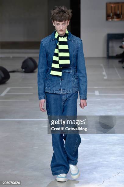 Model walks the runway at the Sunnei Autumn Winter 2018 fashion show during Milan Menswear Fashion Week on January 14, 2018 in Milan, Italy.