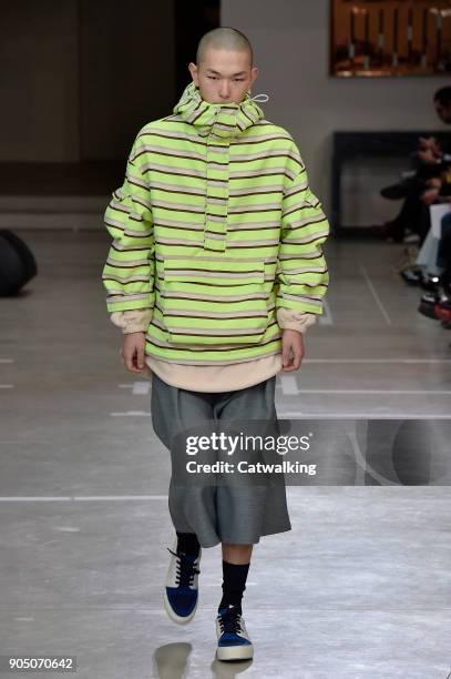 Model walks the runway at the Sunnei Autumn Winter 2018 fashion show during Milan Menswear Fashion Week on January 14, 2018 in Milan, Italy.