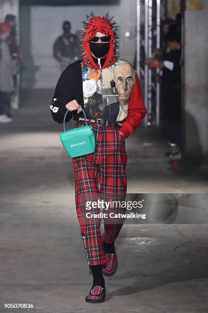 Model walks the runway at the Palm Angels Autumn Winter 2018 fashion show during Milan Menswear Fashion Week on January 14, 2018 in Milan, Italy.