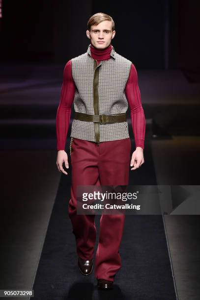 Model walks the runway at the Daks Autumn Winter 2018 fashion show during Milan Menswear Fashion Week on January 14, 2018 in Milan, Italy.