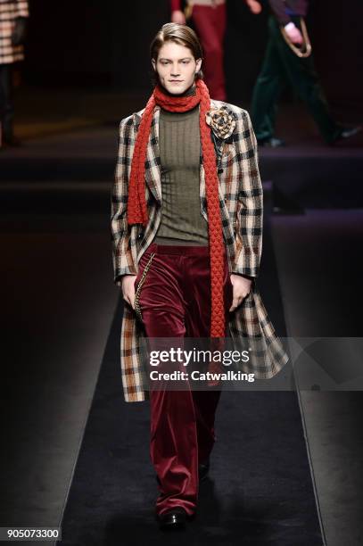 Model walks the runway at the Daks Autumn Winter 2018 fashion show during Milan Menswear Fashion Week on January 14, 2018 in Milan, Italy.