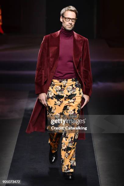 Model walks the runway at the Daks Autumn Winter 2018 fashion show during Milan Menswear Fashion Week on January 14, 2018 in Milan, Italy.