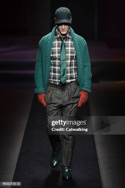 Model walks the runway at the Daks Autumn Winter 2018 fashion show during Milan Menswear Fashion Week on January 14, 2018 in Milan, Italy.