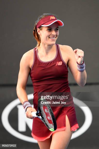 Nicole Gibbs of the United States celebrates winning a point in her first round match against Viktoriya Tomova of Bulgaria on day one of the 2018...