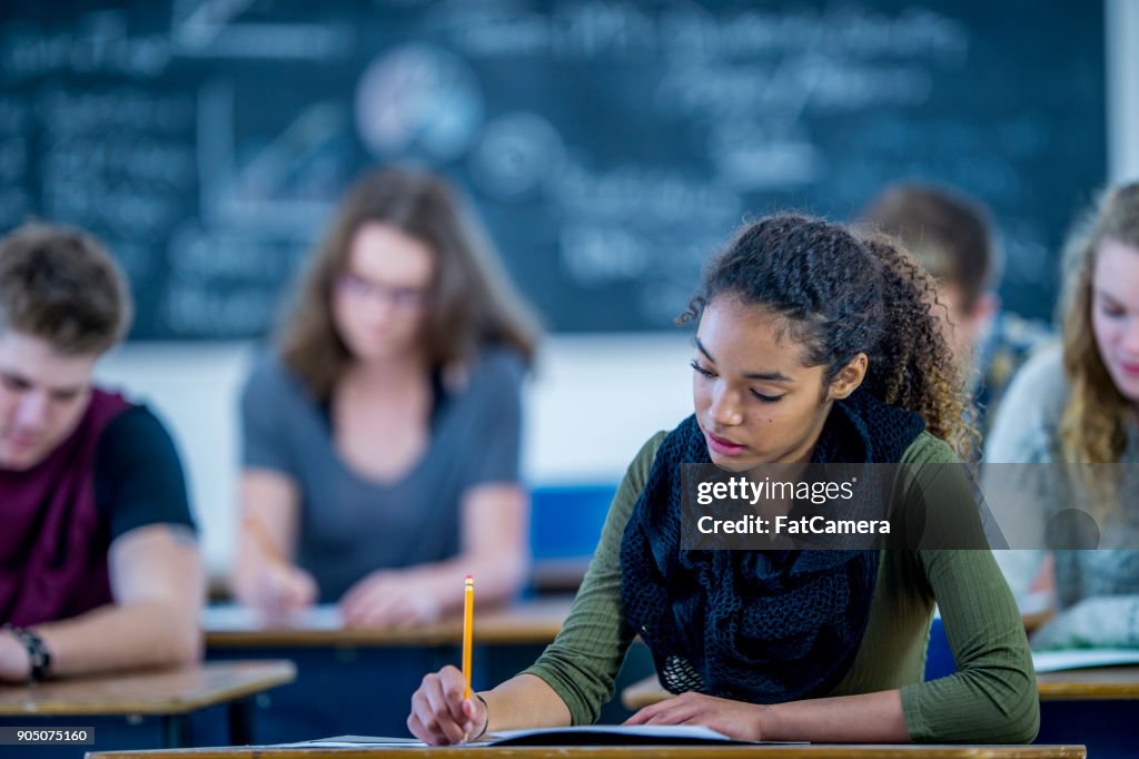 Writing An Exam High-Res Stock Photo - Getty Images